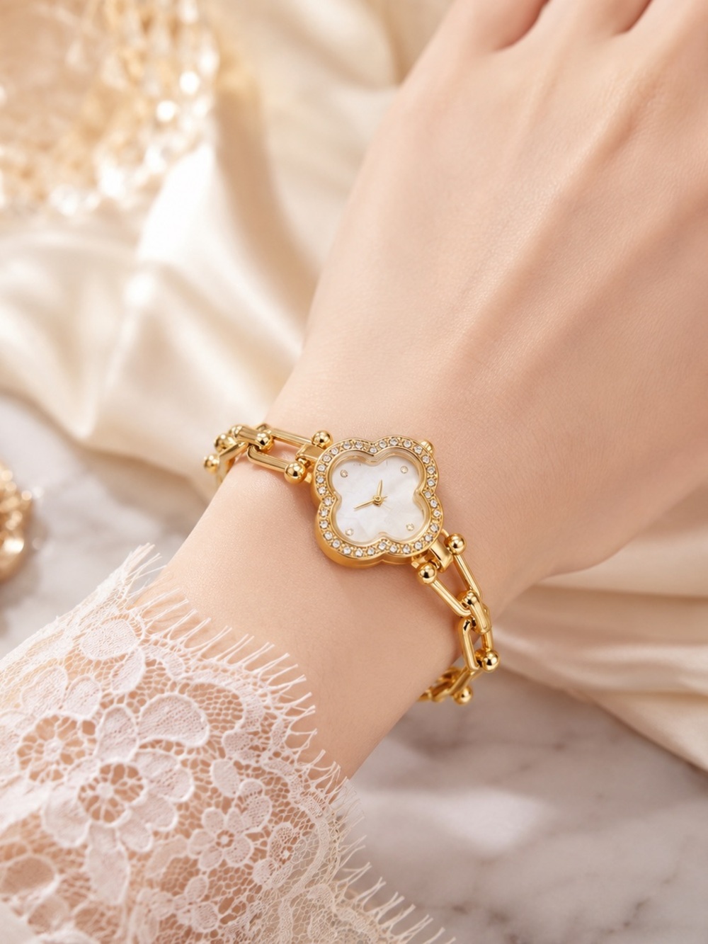 Anthropologie Gold and White Clover Bracelet Watch